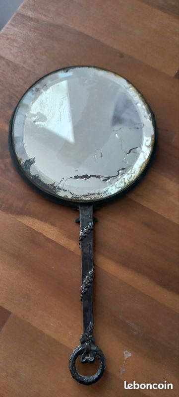 Miroir face à main ancien