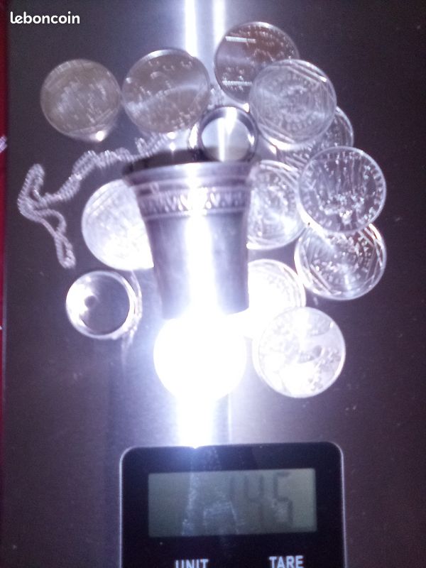 Lot argent + 1 boucle d'oreille or 8 carats